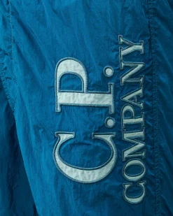C.P. Company U16 Chrome-R Logo Print Swim Shorts Ink Blue Store